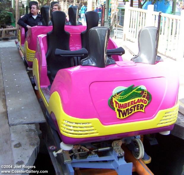 Spinning roller coaster cars