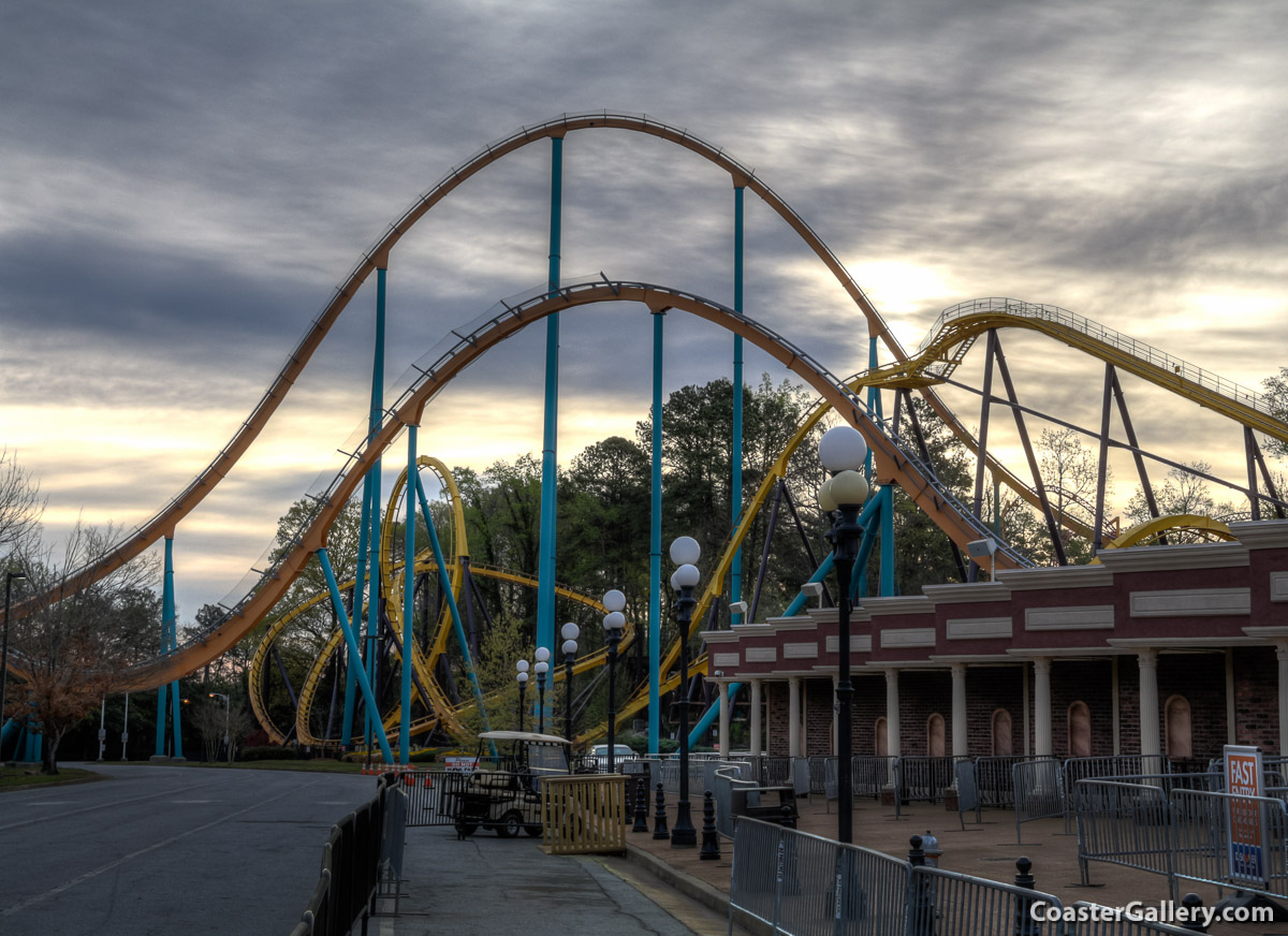 Georgia Scorcher and Goliath roller coasters at sunrise