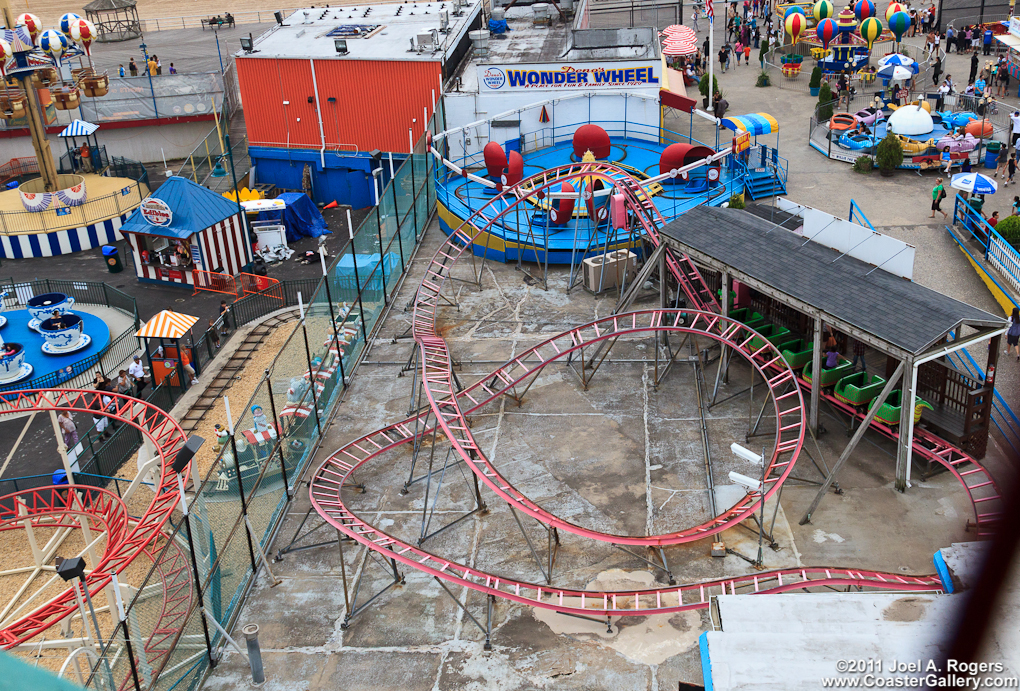 Aerial view of the Miler Sea Serpent roller coaster at Dino's Wonder Wheel Amusement Park