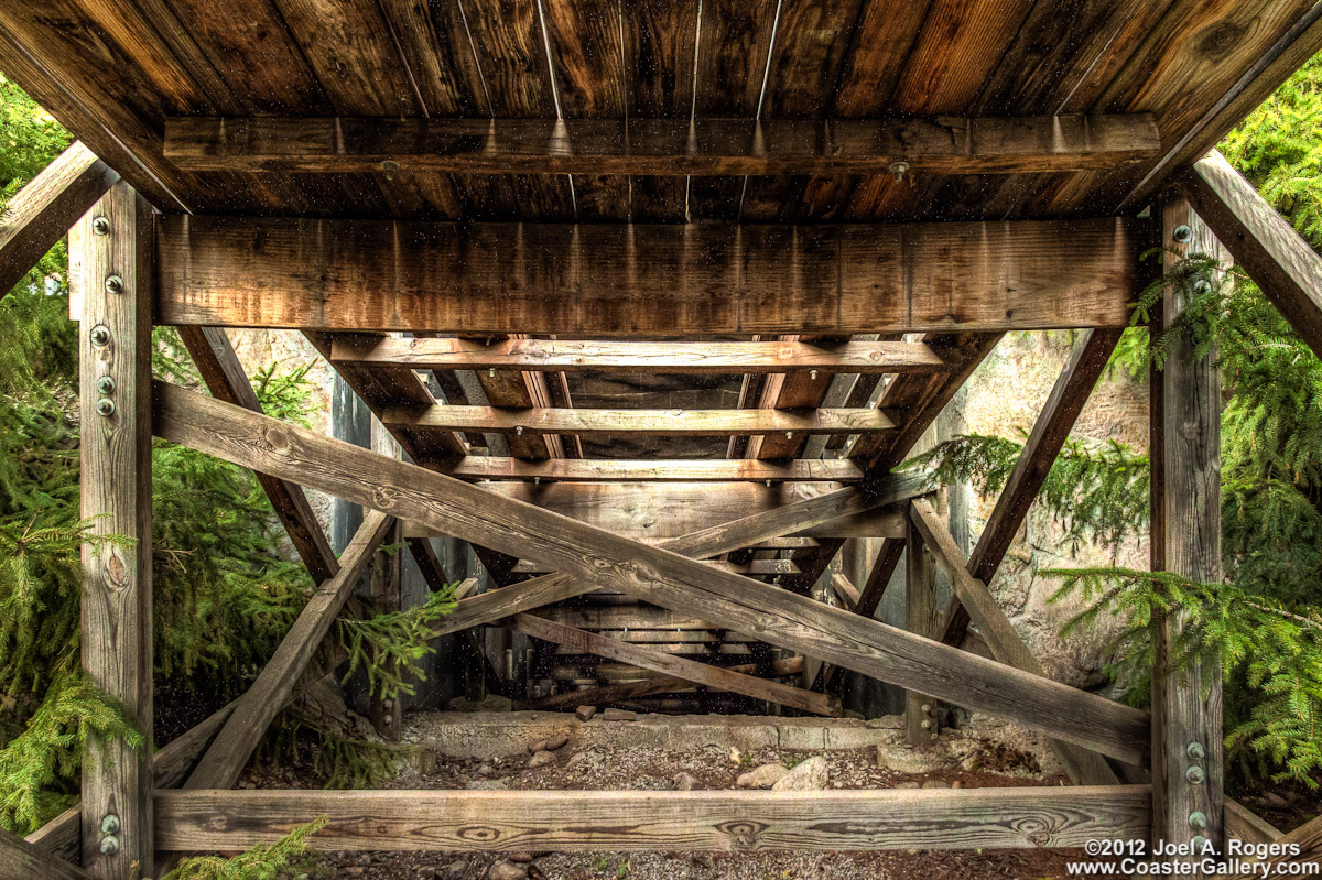 Below wooden roller coaster track