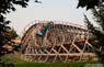 Click to enlarge picture of a roller coaster in the woods