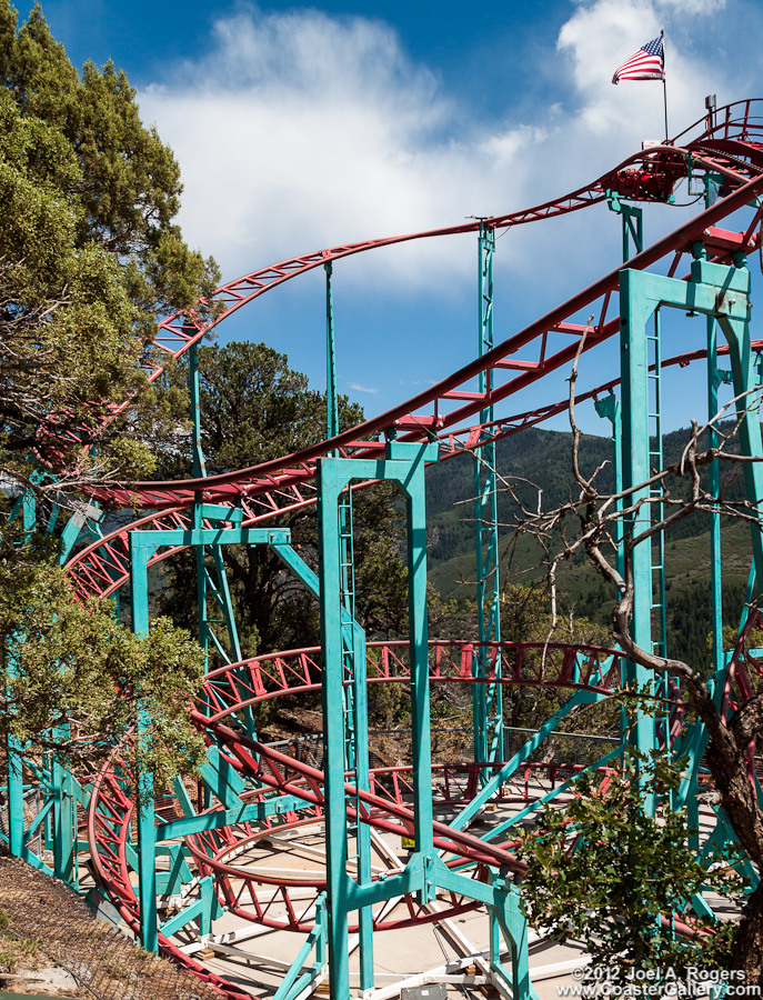 Looking down on a red roller coaster