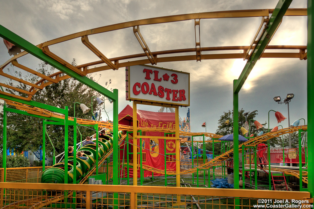 Cloudy skies over a Wacky Worm - Big Apple roller coaster