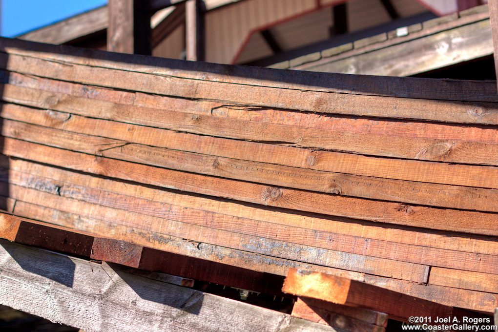 Multiple layers of wood on a roller coaster track