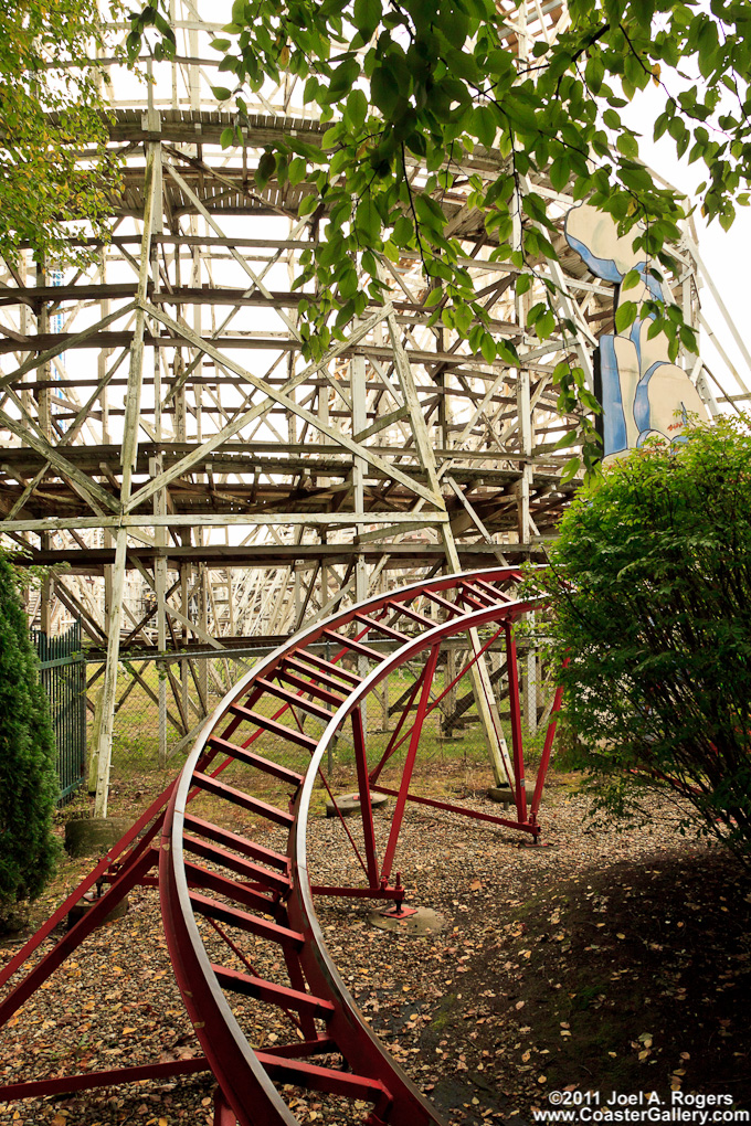 Two roller coasters in the woods