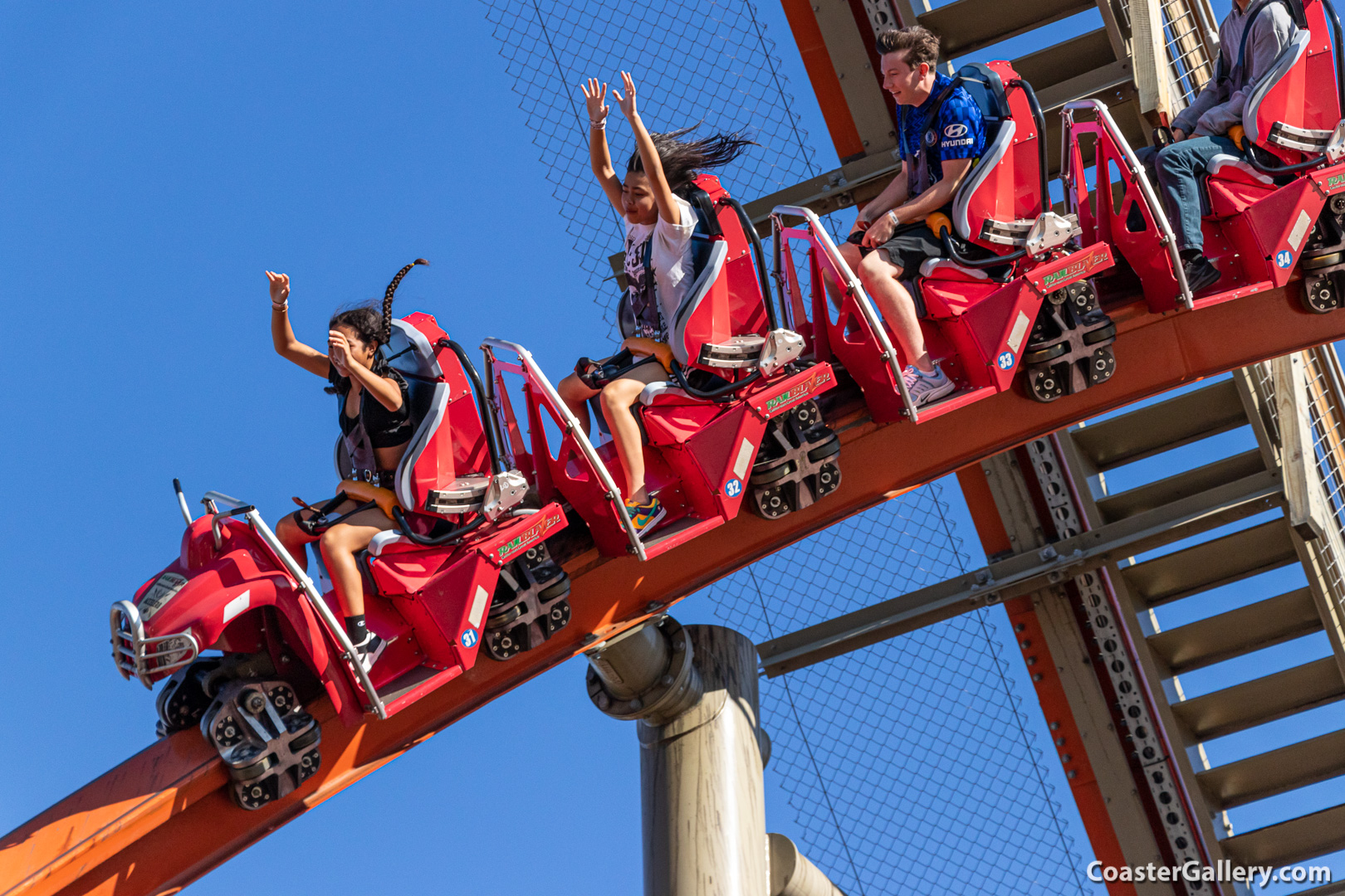 Roller coaster over-the-shoulder restraints