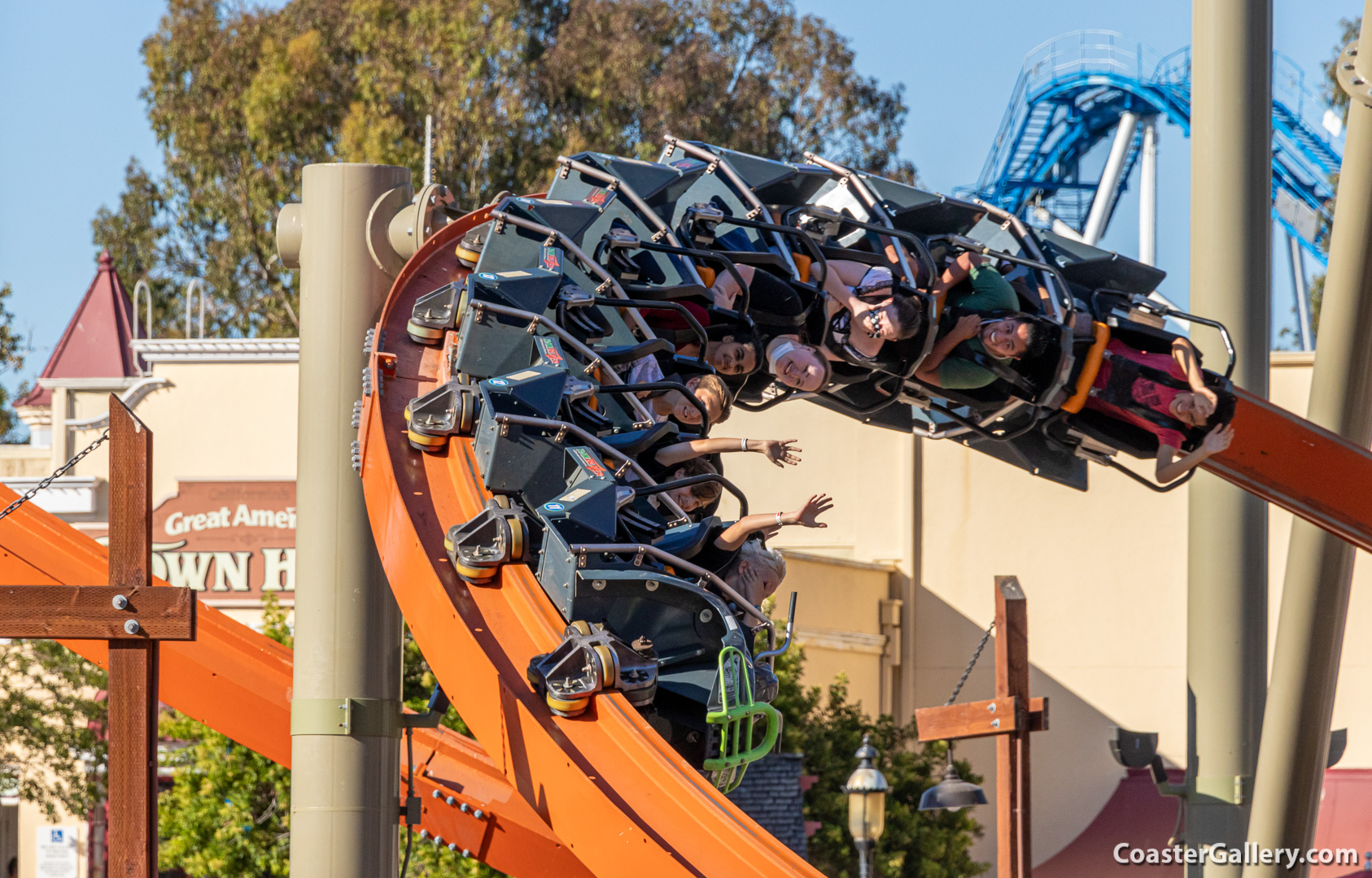 Straddling the rail of a single-rail roller coaster