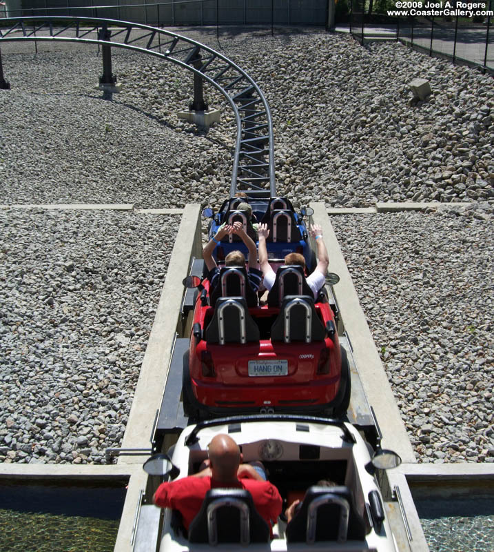 Three mini-Coopers on a roller coaster