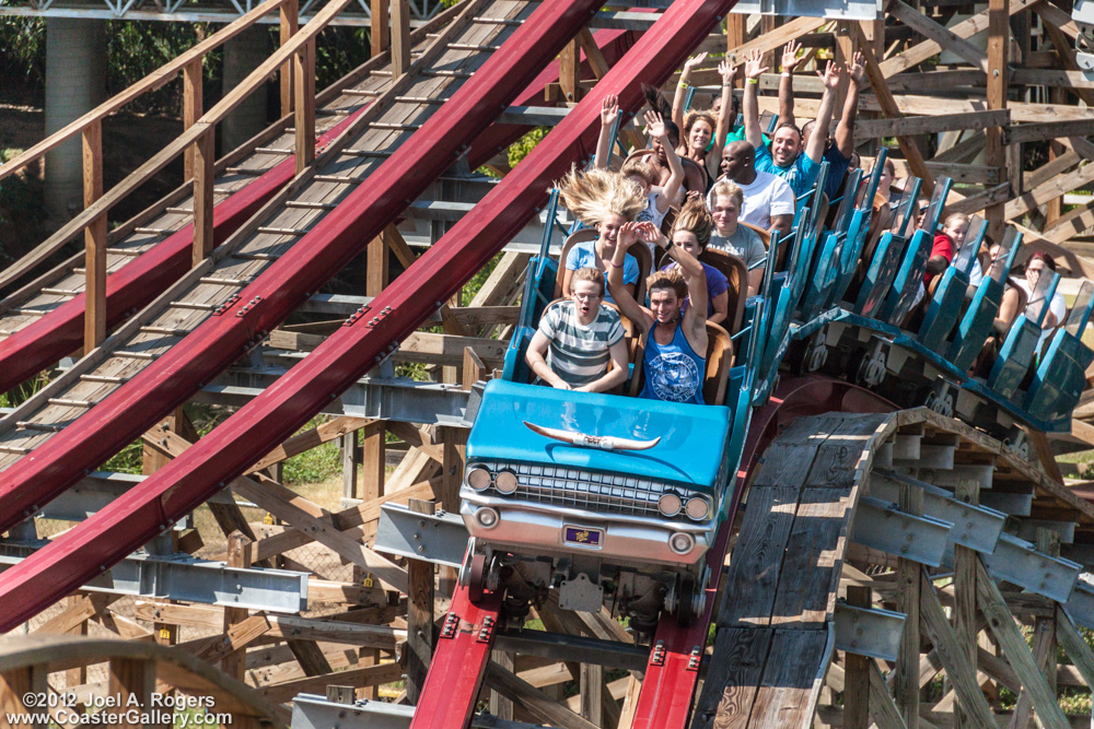 People having fun on a roller coaster