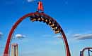 Click to enlarge Superman standing on a roller coaster