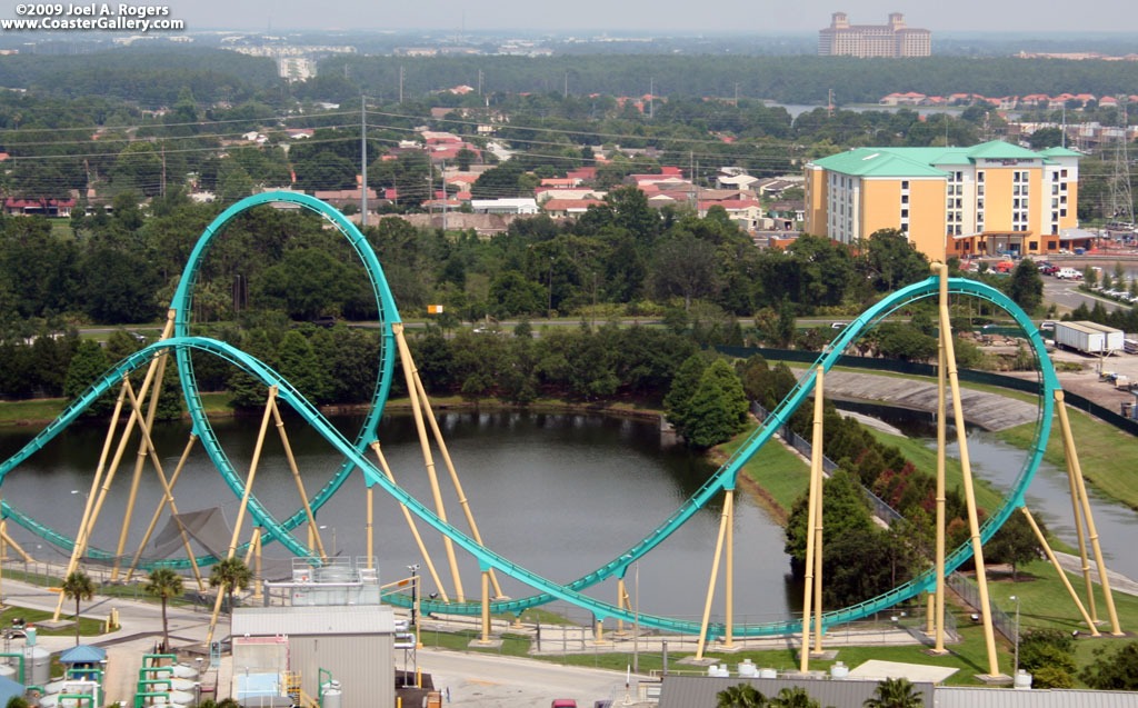 roller coaster next to the lake